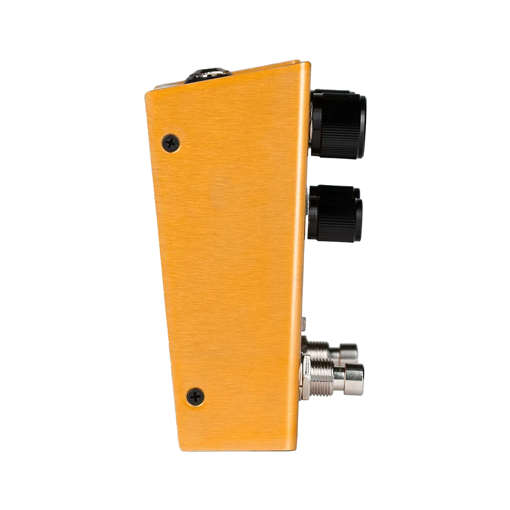 A side view of the gold Meris Enzo guitar pedal