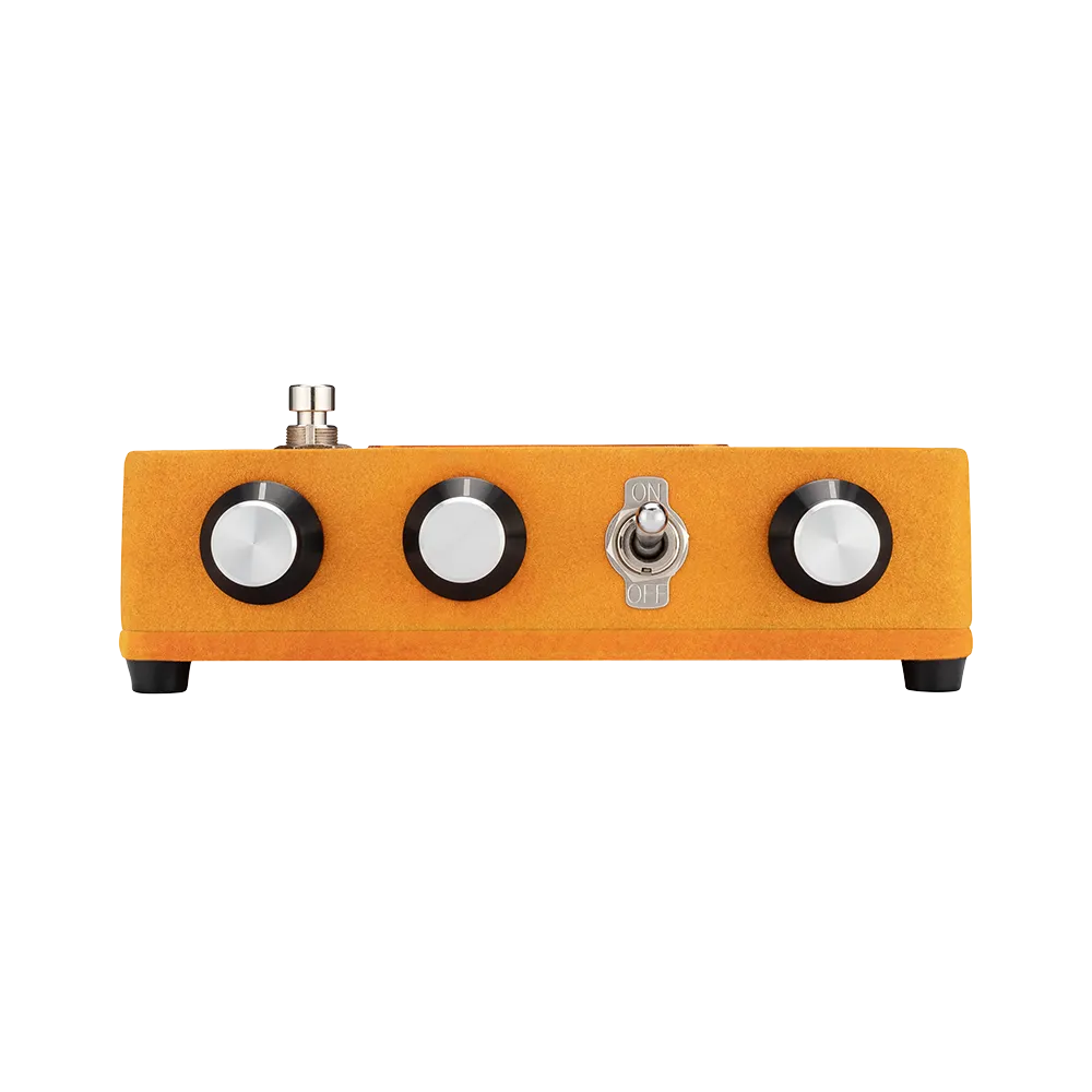A front view of the Warm Audio Foxy guitar pedal, on the front of the pedal are 3 dials to control the output