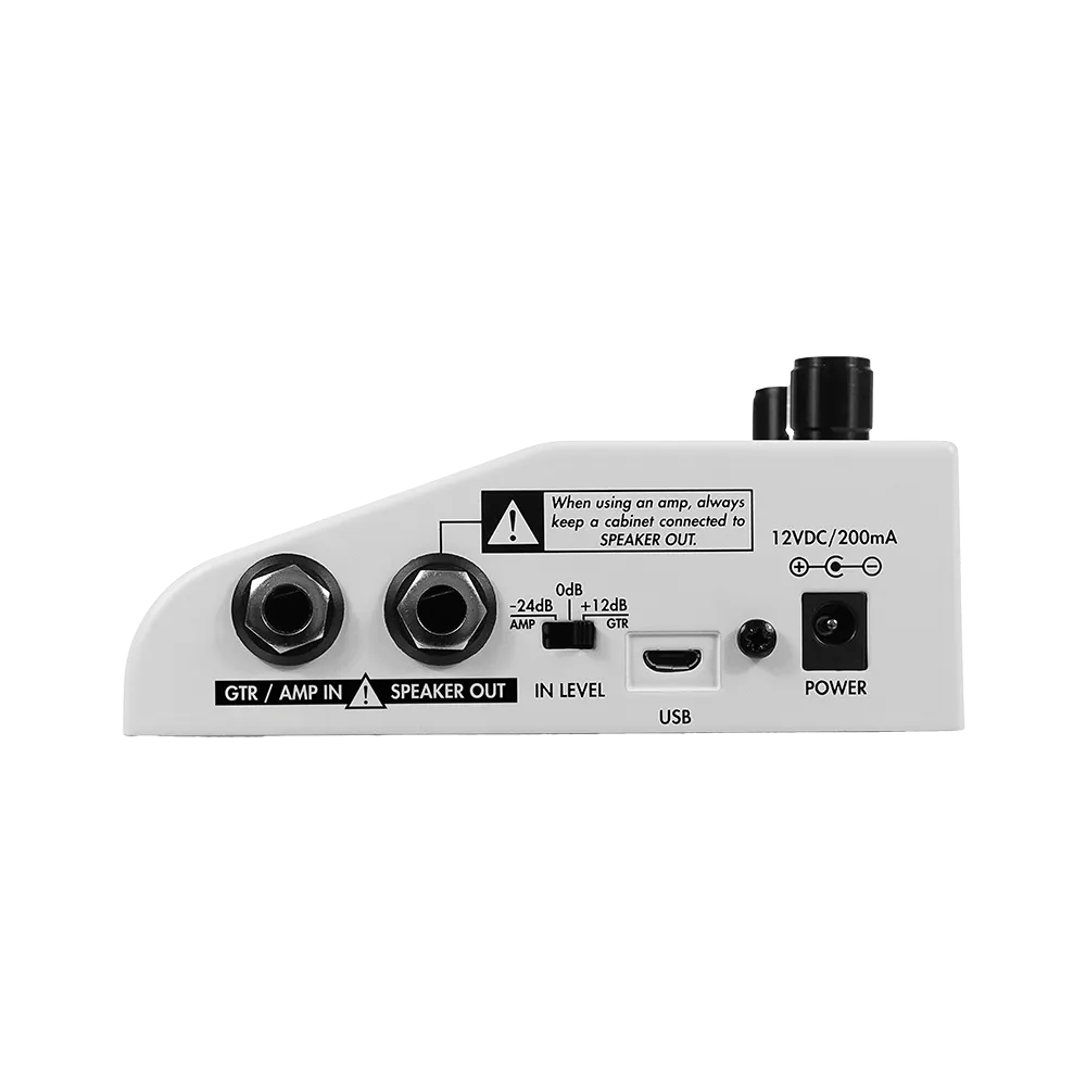 A right side view of the white Two Notes CABM+ guitar pedal, on the side of the pedal are various input/output ports as well as a 12V DC 200mA power port