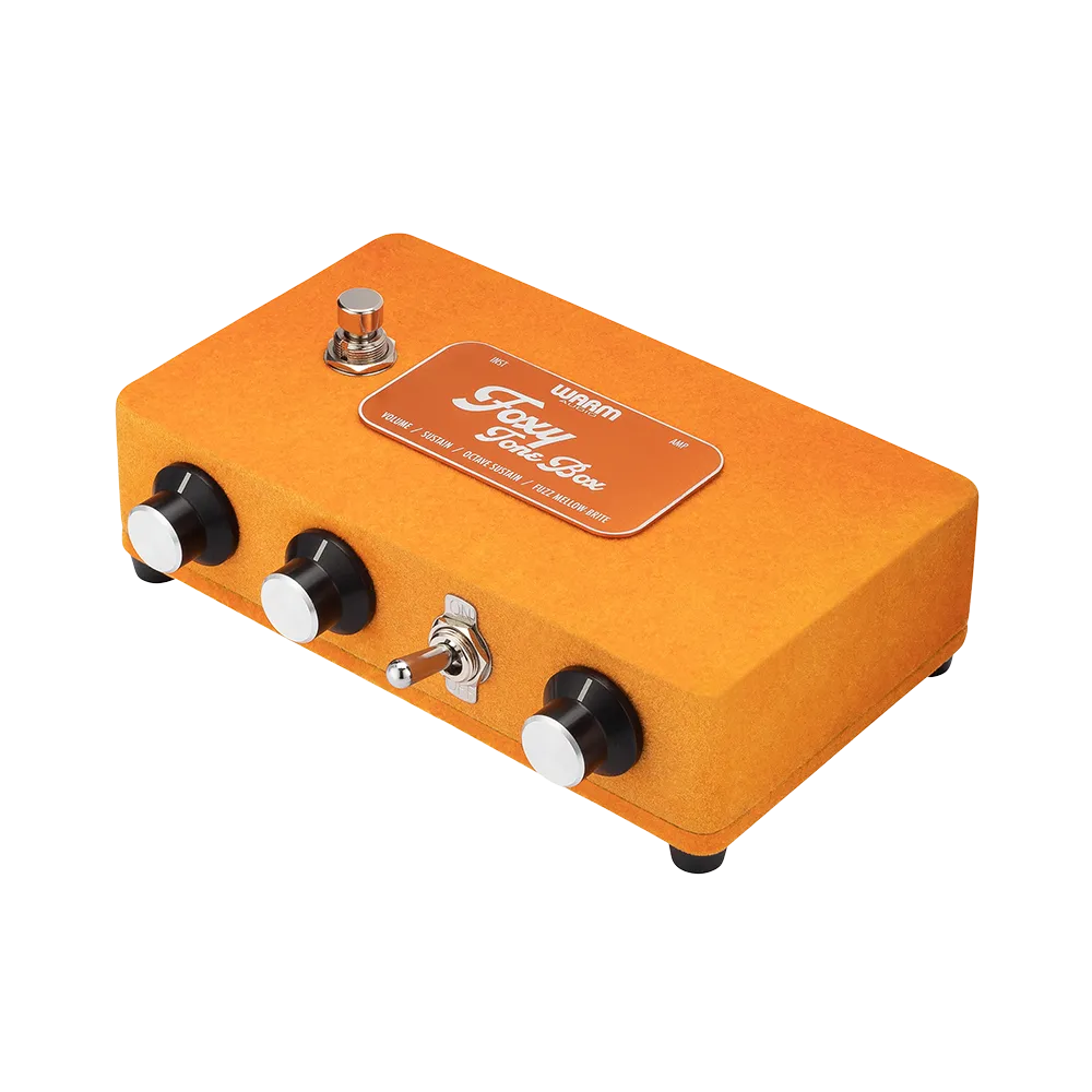 A top/side view of the Warm Audio Foxy guitar pedal, on the front of the pedal are 3 dials to control the output
